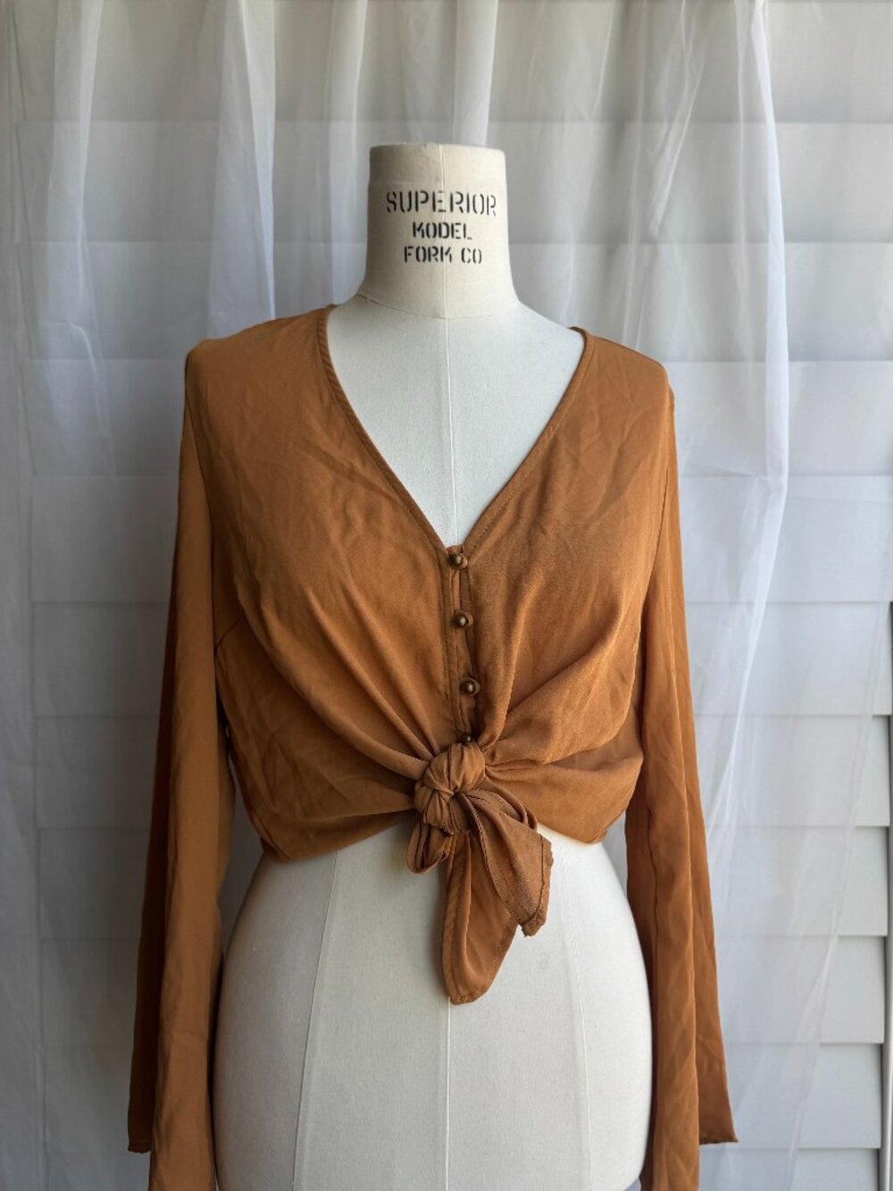 buttoned front tie knot blouse